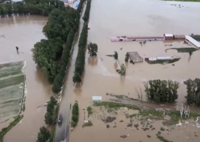 Death Toll Climbs in Flood Zones, China Alerts on Disease Outbreaks